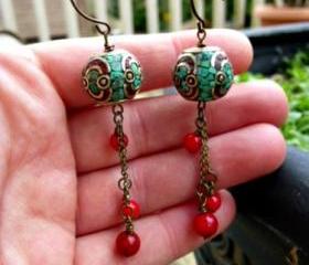 Red coral beads, turquoise inlaid bead. Dangle earrings