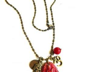Red ceramic buddha meditation charm, bronze Tribe Hill charms, OM pendant, Hamsa Hands, bronze chain necklace 